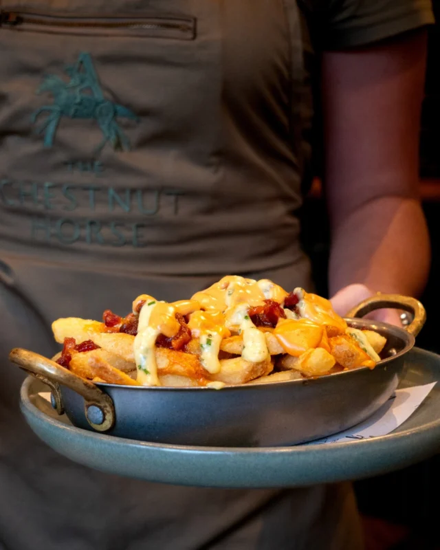 ⁣Autumn walks call for comfort food. 🍂

Kick off your evening with our Dirty Fries, piled high with cheese sauce, BBQ pulled pork, crispy onions and burger sauce. 

The perfect addition to your pub classic dinner, ideal for sharing with friends (or keeping all to yourself, we won’t judge).

Book your table tonight and tuck in at The Chestnut Horse. 🐴🌿
#TheChestnutHorse #VisitHampshire #Winchester #CountryPub